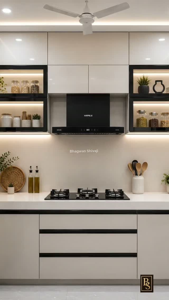 Modern cream kitchen cabinets with black trim and illuminated open shelving units.