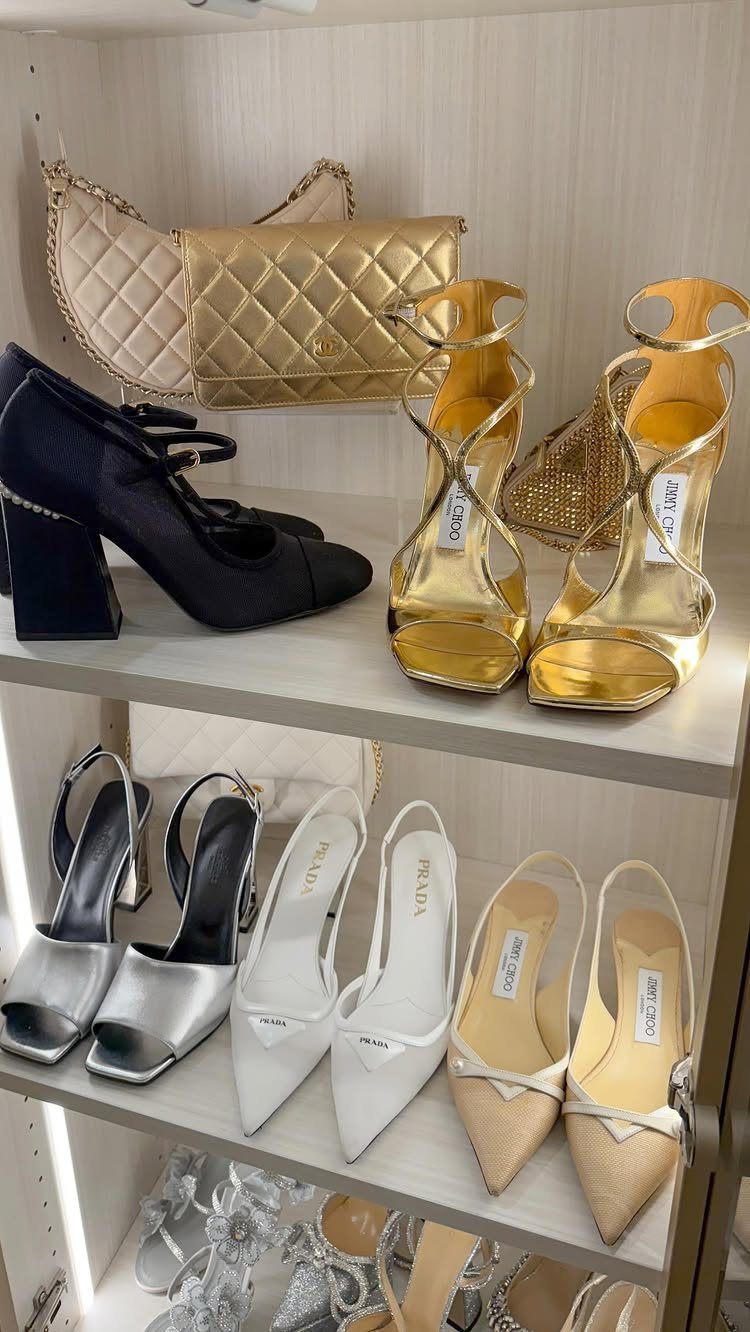 11 Ideas to Organize a Closet for Maximum Storage 9 Designer gold shoes and a quilted handbag arranged neatly on white closet shelves.